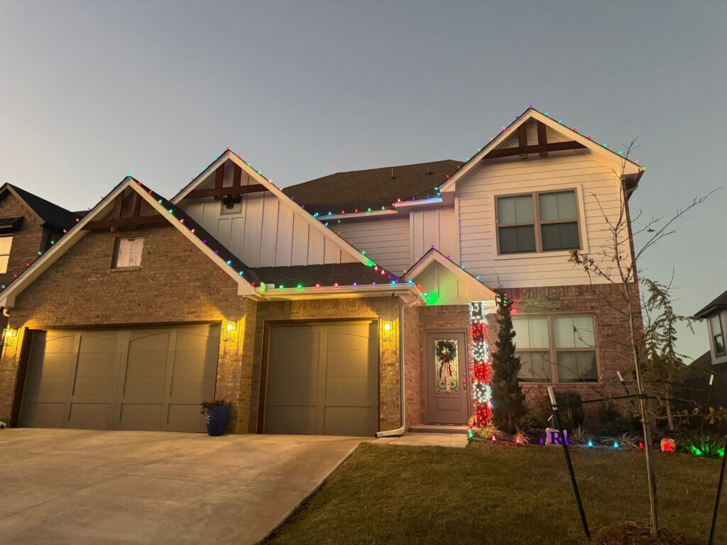 Festive Multicolor Roofline And Candy Cane Decoration Edmond OK