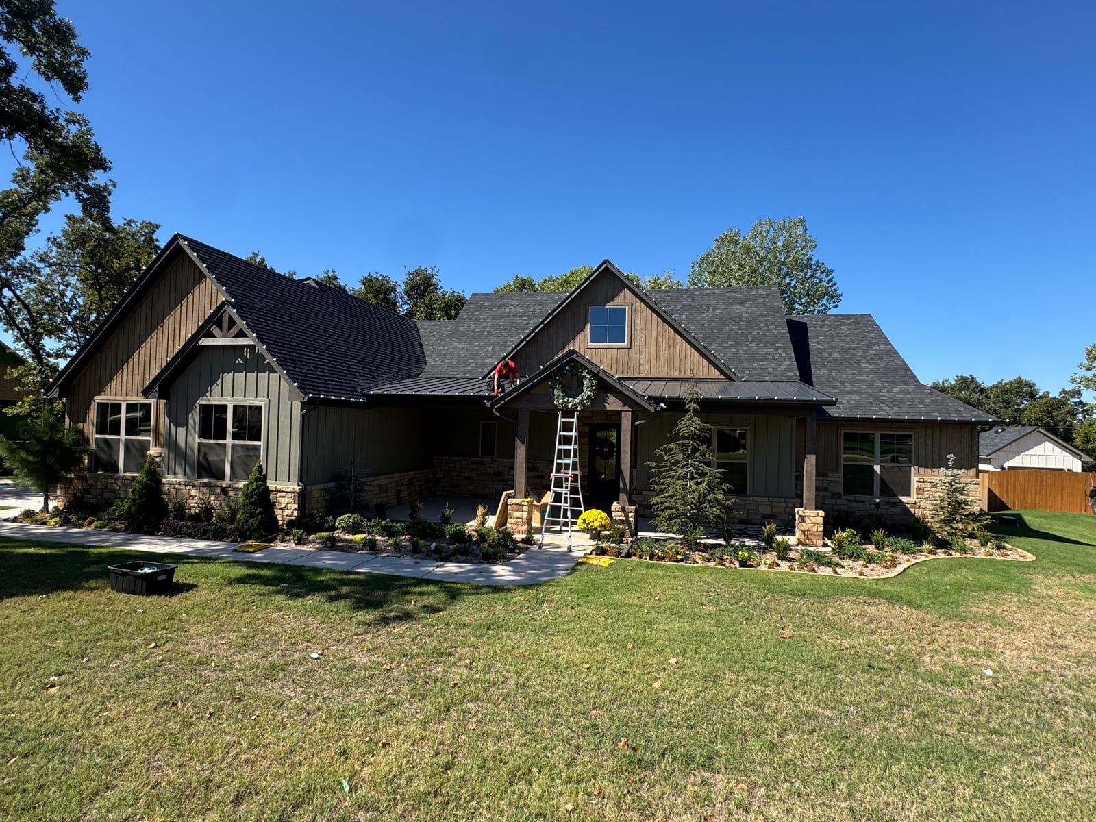 Residential holiday lighting and wreath installation in Arcadia OK
