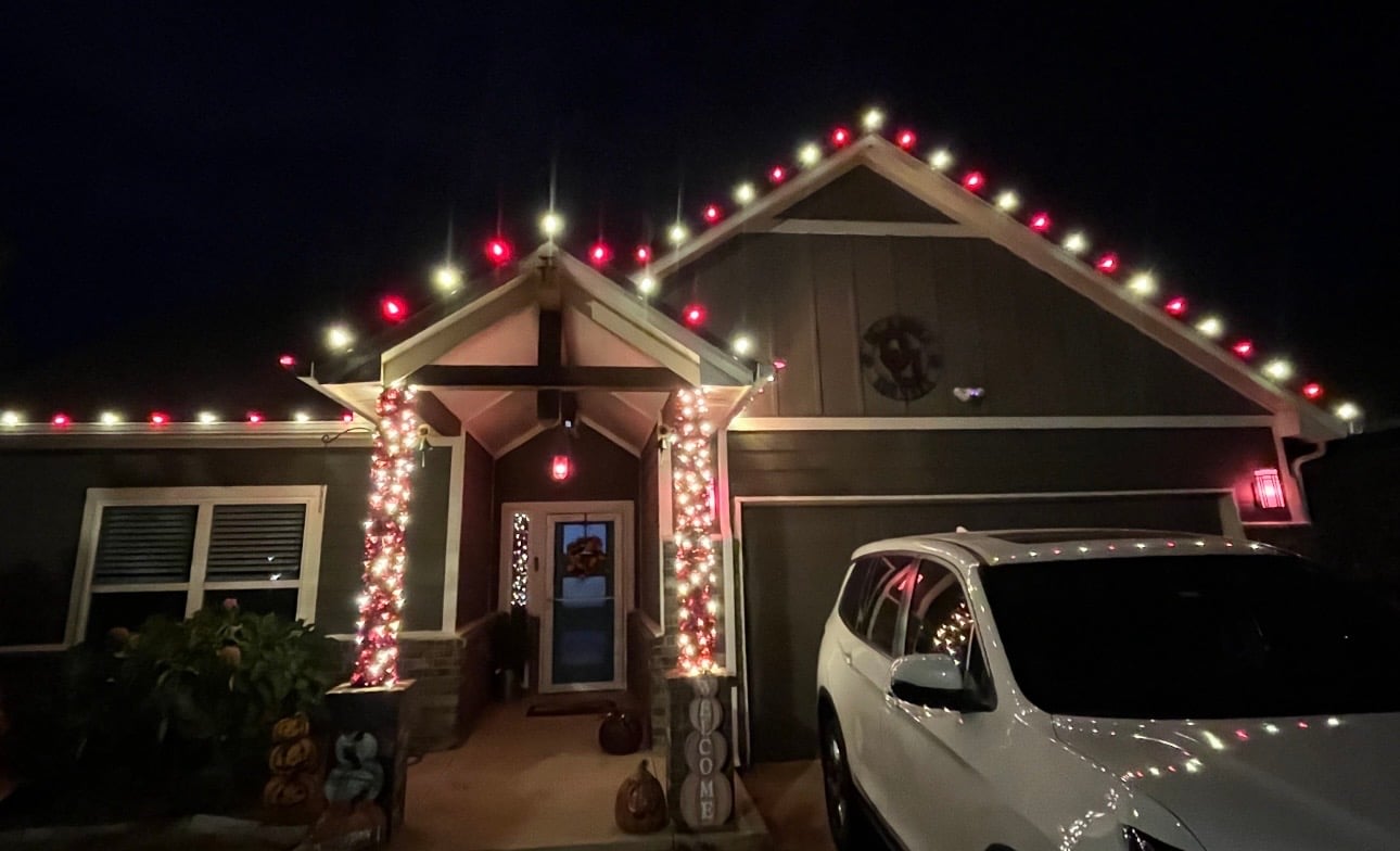 Residential candy cane style Christmas light installation