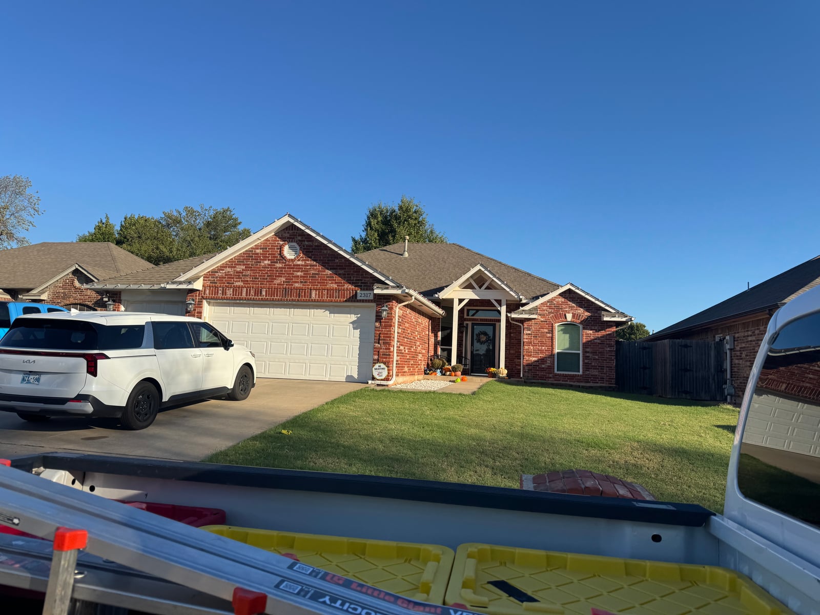 Professional Christmas roofline lighting installation on residential home